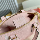 Front view of polished sleek women's handbag – women's statement bag