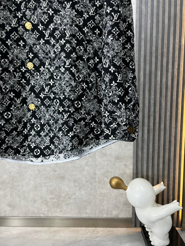 Back view of Louis Vuitton luxury clothing with label-forward styling