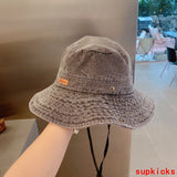 Close-up detail view of Louis Vuitton unisex cap