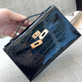 Side view of polished structured handbag