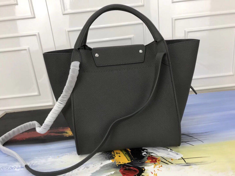 Styled lifestyle shot of refined statement women's handbag – women's everyday handbag