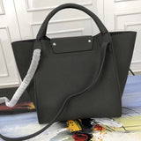 Styled lifestyle shot of refined statement women's handbag – women's everyday handbag