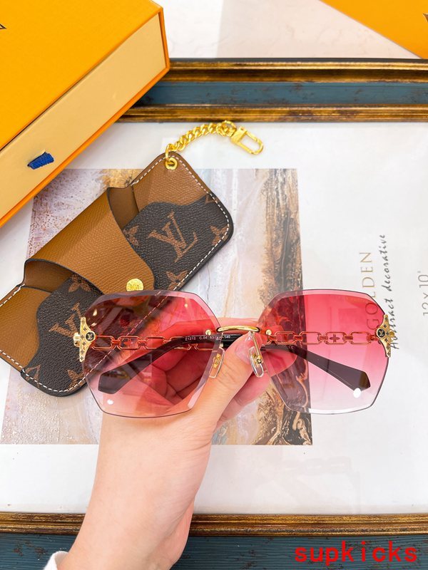 Close-up detail view of Louis Vuitton unisex sunglasses