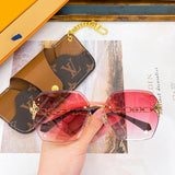 Close-up detail view of Louis Vuitton unisex sunglasses