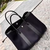 Close-up detail of statement bag design