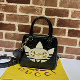 Side profile of classic structured women's handbag – women's statement bag