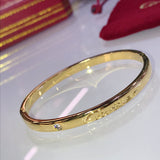 Side view of Cartier unisex jewelry piece