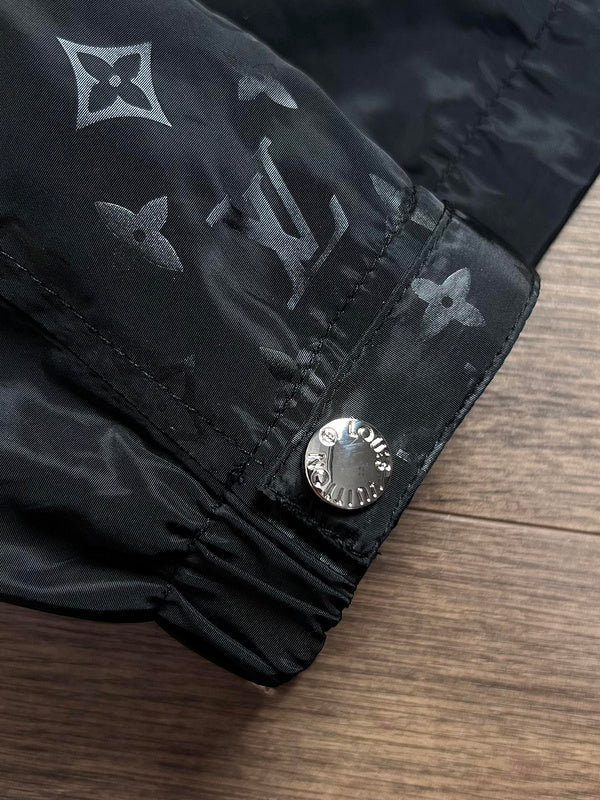 Front view of Louis Vuitton luxury clothing with logo-detail design
