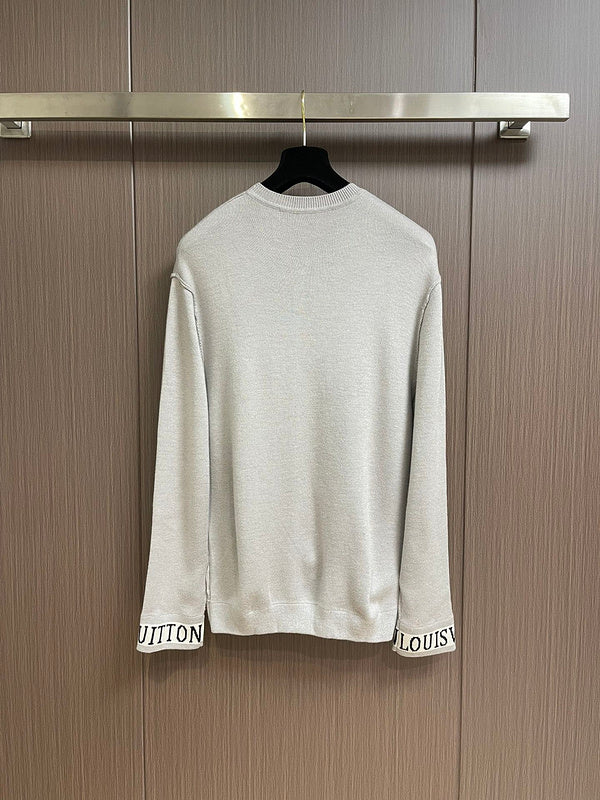 Side profile of Louis Vuitton luxury clothing with signature branding