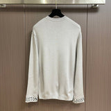 Side profile of Louis Vuitton luxury clothing with signature branding