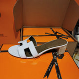 Hermes sandals Style 018 - angled studio shot