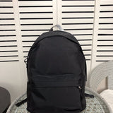 Front view of sleek modern women's handbag – women's statement bag