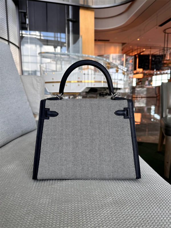  Signature crossbody bag carried on shoulder 10