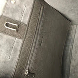 Side profile of refined statement women's handbag – women's everyday handbag
