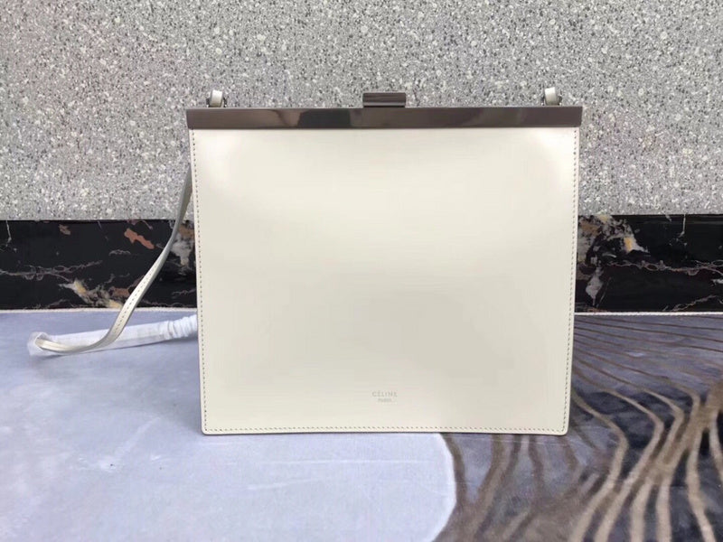 Front view of statement polished women's handbag – women's statement bag