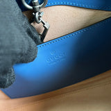 Side profile of modern chic women's handbag – women's luxury accessory