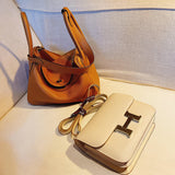 Side view of modernist structured handbag
