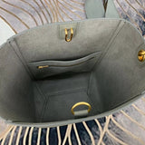 Styled lifestyle shot of elevated signature women's handbag – women's luxury handbag