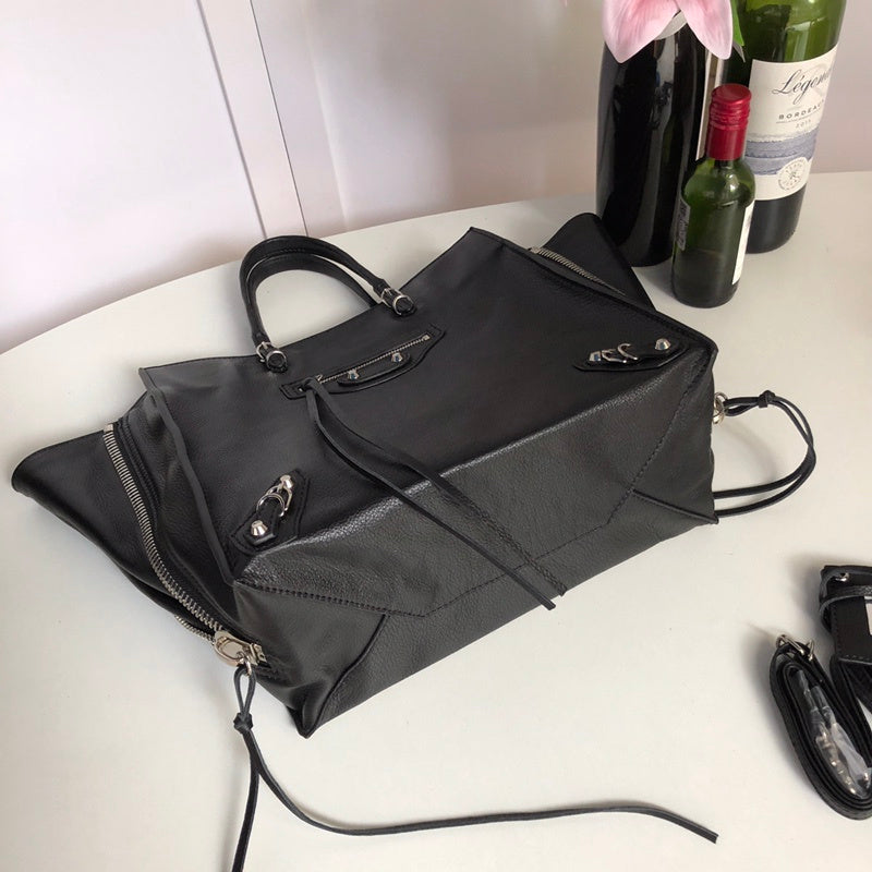 Styled lifestyle shot of refined polished women's handbag – women's premium purse