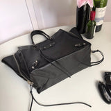Styled lifestyle shot of refined polished women's handbag – women's premium purse