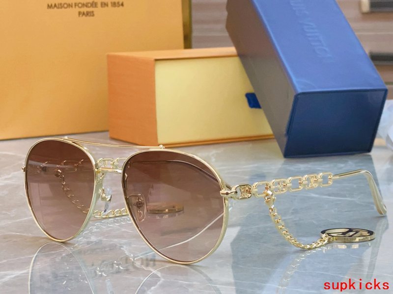 Close-up detail view of Louis Vuitton unisex sunglasses