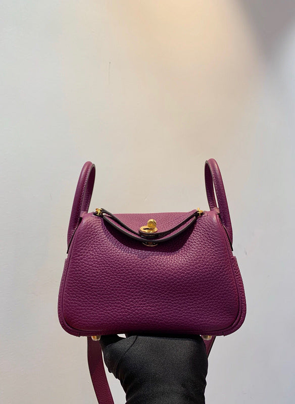 Side view of refined structured handbag
