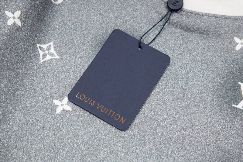 Flat lay presentation of Louis Vuitton luxury clothing with runway-inspired design