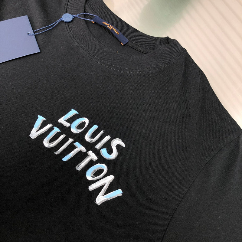 Close-up detail shot of Louis Vuitton cotton t-shirt with label-forward styling