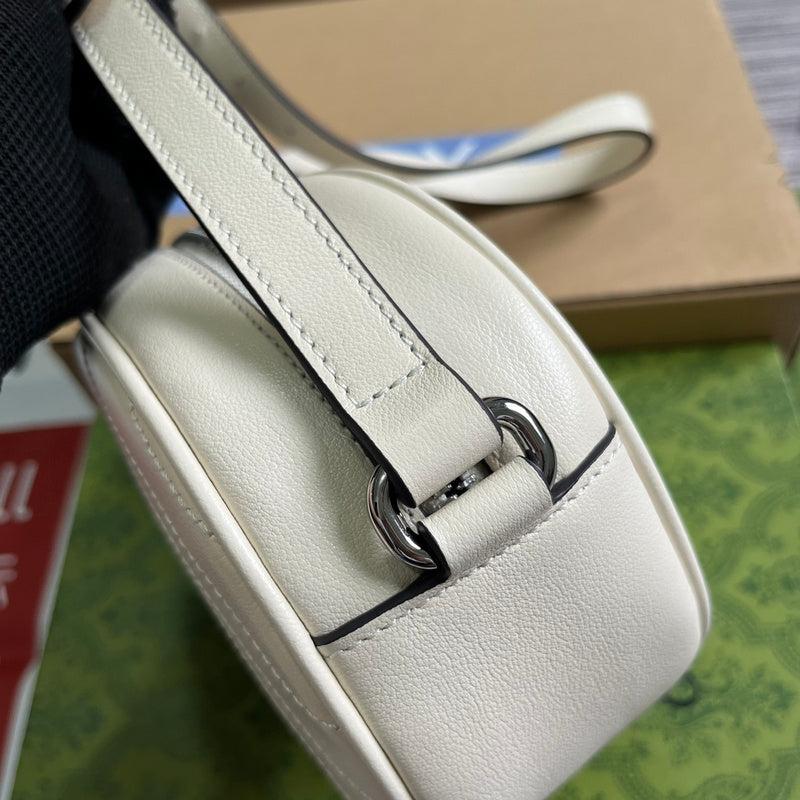 Styled lifestyle shot of polished signature women's handbag – women's luxury accessory