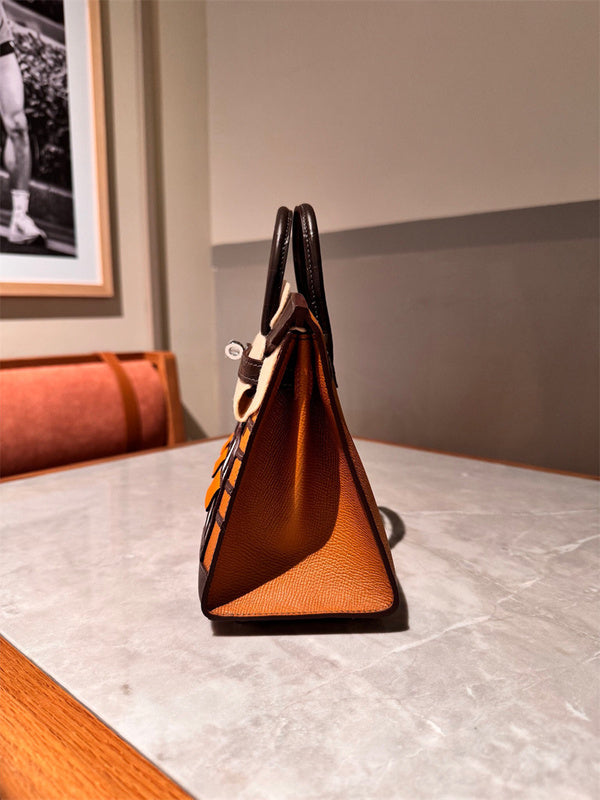 Side view of polished structured handbag