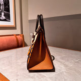 Side view of polished structured handbag