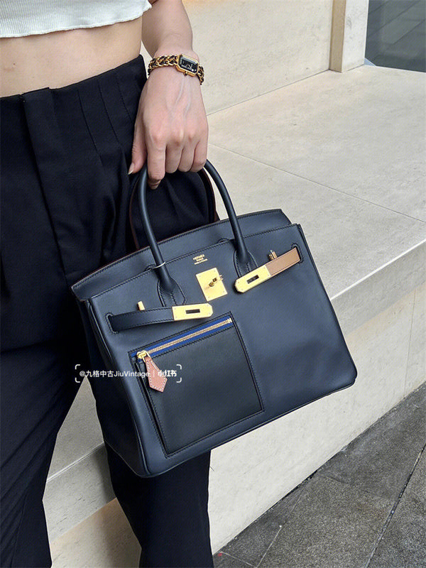 Side view of effortless structured handbag