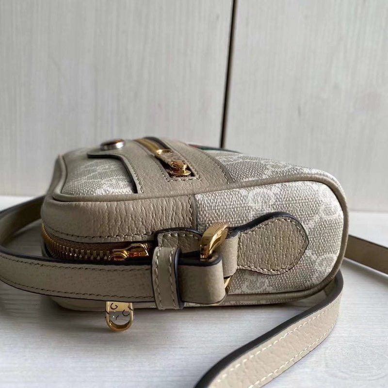 Handle and strap detail of structured polished women's handbag – women's designer-style accessory