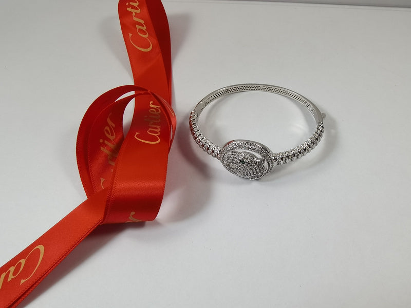 Angled view of Cartier unisex jewelry piece