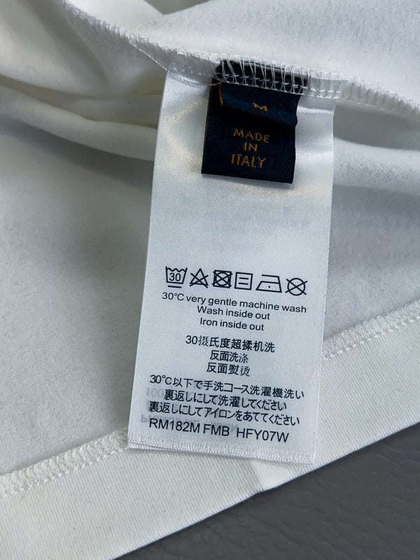 Close-up detail shot of Louis Vuitton luxury clothing with everyday silhouette