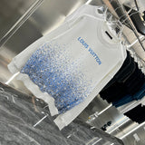 Side profile of Louis Vuitton luxury clothing with tailored silhouette