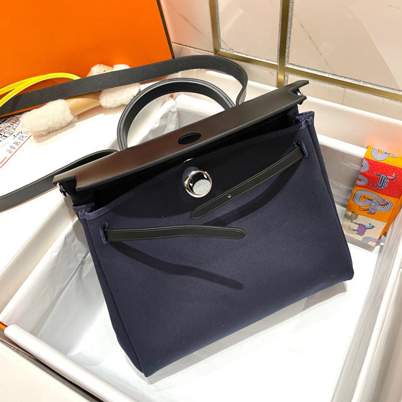 Side view of streamlined structured handbag