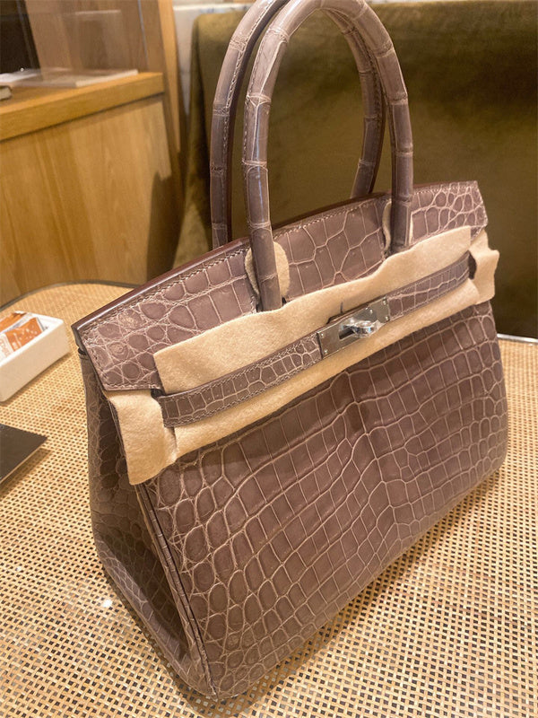  Refined carryall bag carried on shoulder 40