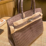  Refined carryall bag carried on shoulder 40