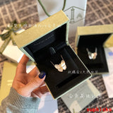 Close-up detail view of Van Cleef & Arpels unisex jewelry piece