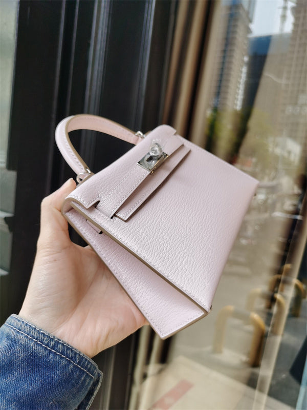  Signature crossbody bag carried on shoulder 10