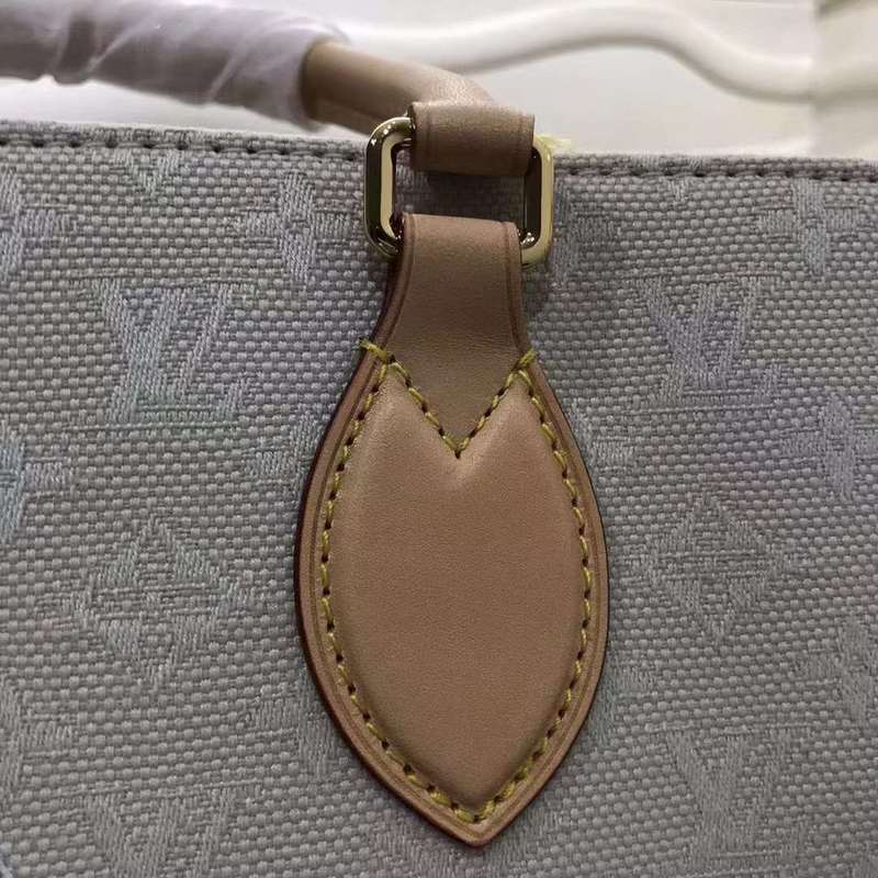 Back view of everyday-luxe polished women's handbag – women's statement bag