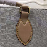 Back view of everyday-luxe polished women's handbag – women's statement bag
