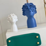 Back view of signature chic women's handbag – women's designer-style accessory