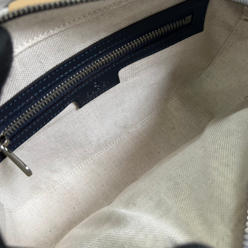 Close-up detail of structured classic women's handbag – women's luxury handbag