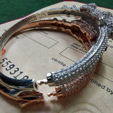 Front view of Cartier unisex jewelry piece
