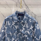 Close-up detail shot of Louis Vuitton luxury clothing with label-forward styling