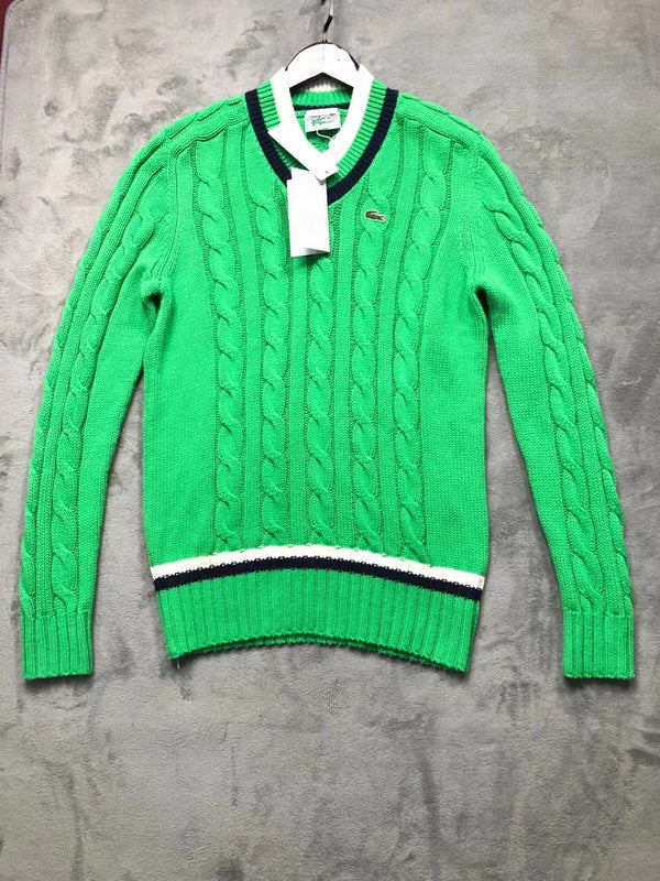 Close-up detail shot of Lacoste luxury clothing with monogram-inspired silhouette