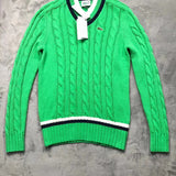 Close-up detail shot of Lacoste luxury clothing with monogram-inspired silhouette