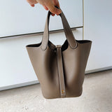  Structured crossbody bag carried on shoulder 16